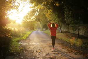 A photo of a woman walking outdoors