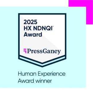 Badge for 2025 Human Experience NDNQUI Award for Nursing Excellence - White Badge with navy text on light blue background with hot pink elements. 