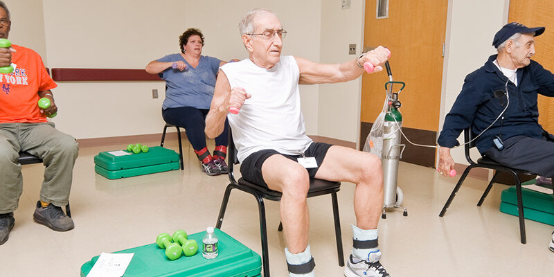 Patients participating in pulmonary rehabilitation with hand and ankle weights